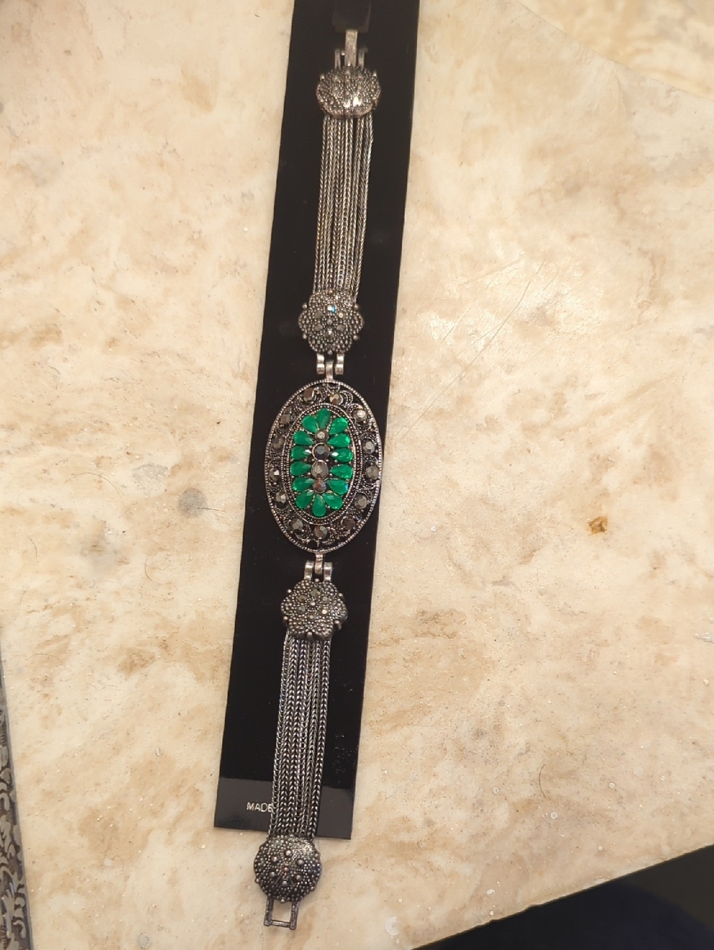 Vintage-Style Silver Bracelet with Green Stone Center